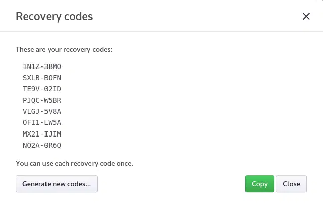 The recovery codes dialog, listing eight single-use codes with one already crossed out.
